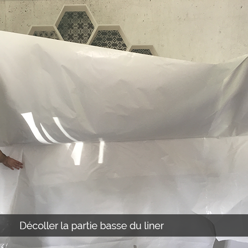 Décoller la partie du liner de la toile Toile adhésive